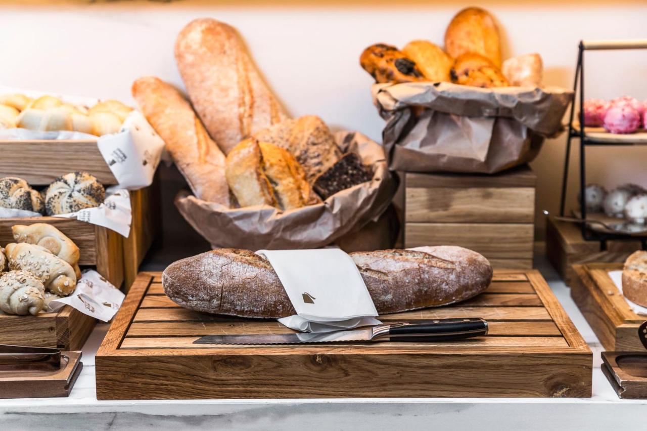 The Julius Prague Hotel Exterior photo Bread at a bakery